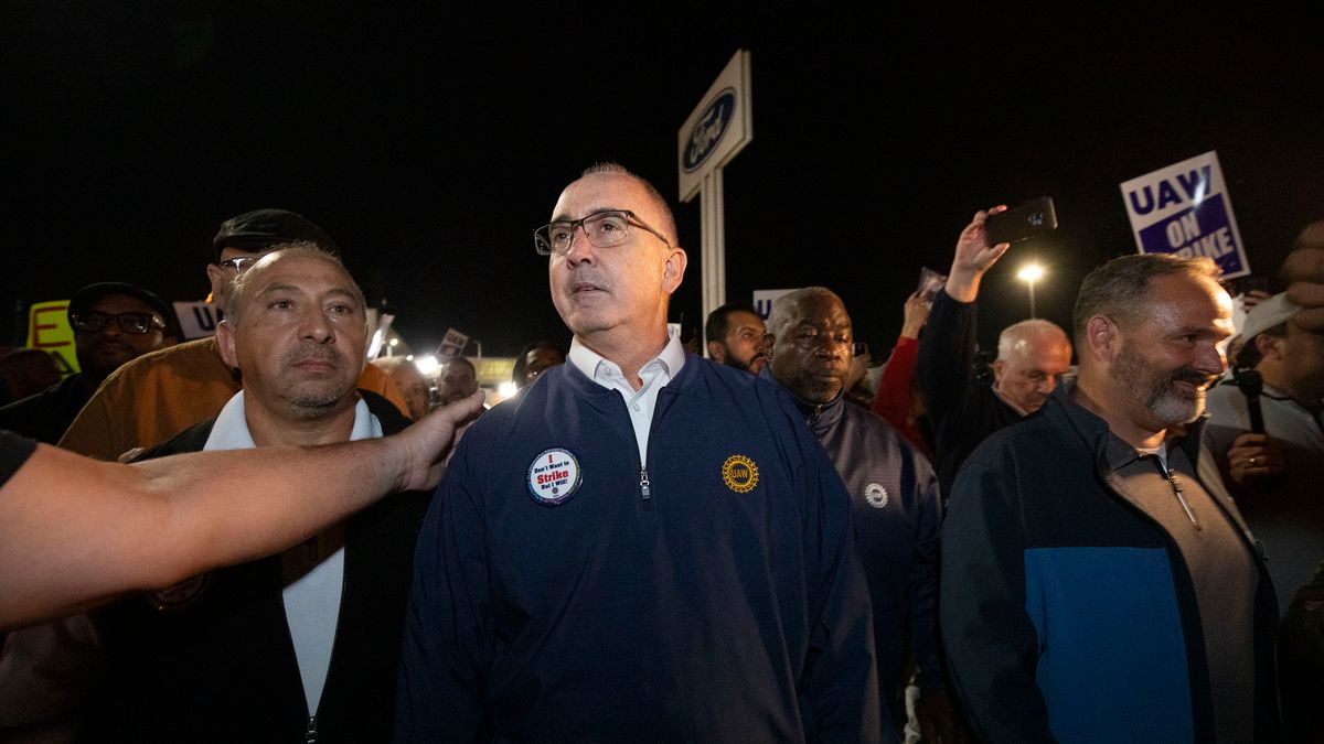 UAW president Shawn Fain speaks with union members outside of Ford's Michigan Assembly Plant.