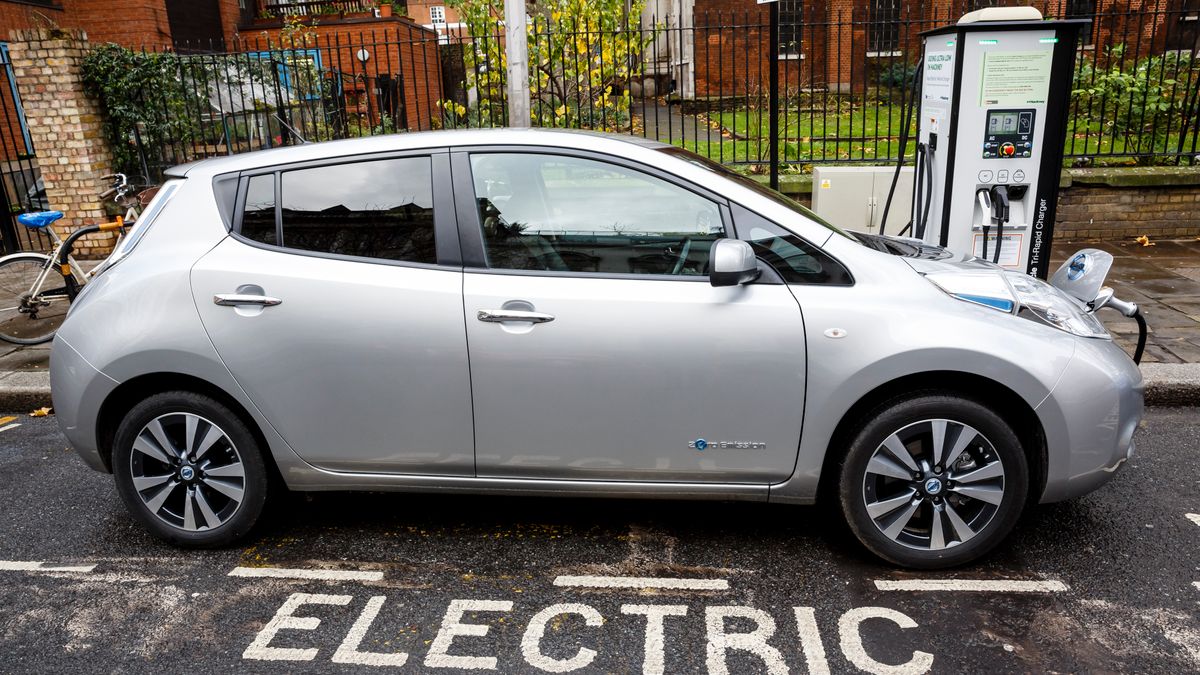 A silver Go Ultra Low Nissan LEAF on charge on a London street.